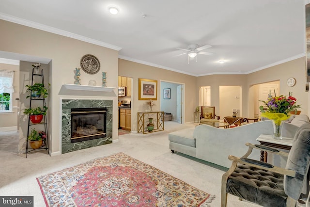 20810 Noble Ter Unit 104, Sterling, VA 20165 - living area featuring light colored carpet, ceiling fan, crown molding, and a high end fireplace