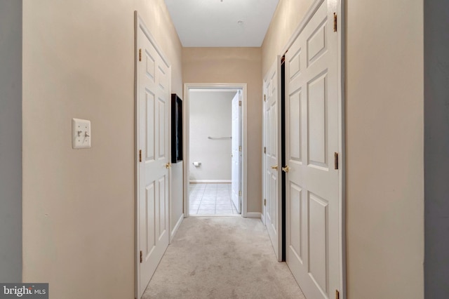 20810 Noble Ter Unit 104, Sterling, VA 20165 - hallway with light carpet and baseboards