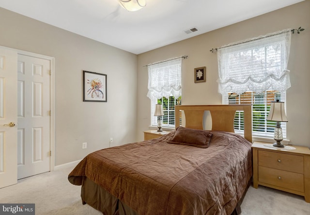 20810 Noble Ter Unit 104, Sterling, VA 20165 - bedroom with light carpet and baseboards