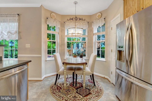 20810 Noble Ter Unit 104, Sterling, VA 20165 - dining room featuring a chandelier and light tile patterned floors