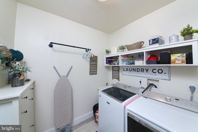366 High St, Souderton, PA 18964 - laundry room featuring washer and clothes dryer and light wood-style floors