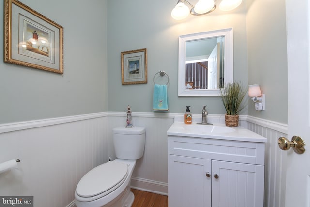 366 High St, Souderton, PA 18964 - bathroom featuring a wainscoted wall, vanity, and wood finished floors