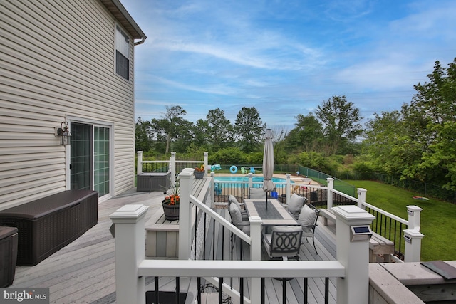 366 High St, Souderton, PA 18964 - wooden terrace with outdoor dining area, view of wooded area, and a fenced backyard