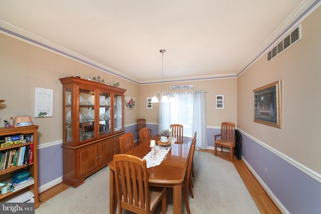 366 High St, Souderton, PA 18964 - dining space with light wood-type flooring and ornamental molding