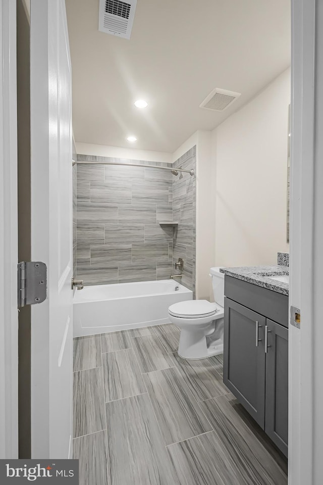11466 Mesa Verde Ct, White Plains, MD 20695 - bathroom featuring vanity, shower / washtub combination, and recessed lighting