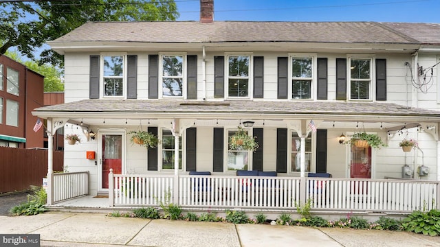 16 E Jefferson St, Newtown, PA 18940 - view of front of property featuring a porch and a shingled roof