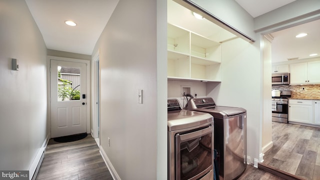 16 E Jefferson St, Newtown, PA 18940 - laundry room featuring washer and clothes dryer, light wood-type flooring, and recessed lighting