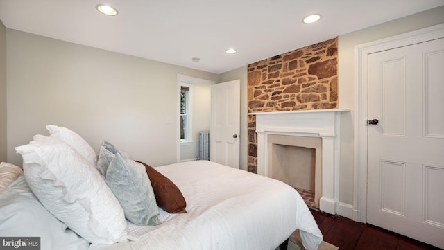 16 E Jefferson St, Newtown, PA 18940 - bedroom featuring a large fireplace, dark wood-style flooring, radiator heating unit, and recessed lighting