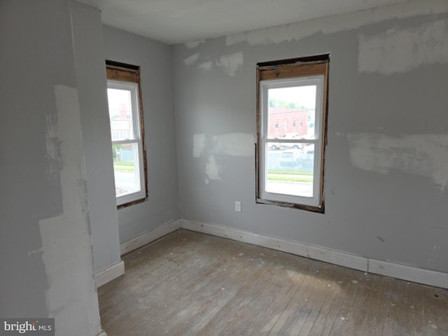 132 N Franklin Blvd, Pleasantville, NJ 08232 - spare room featuring wood-type flooring and healthy amount of natural light