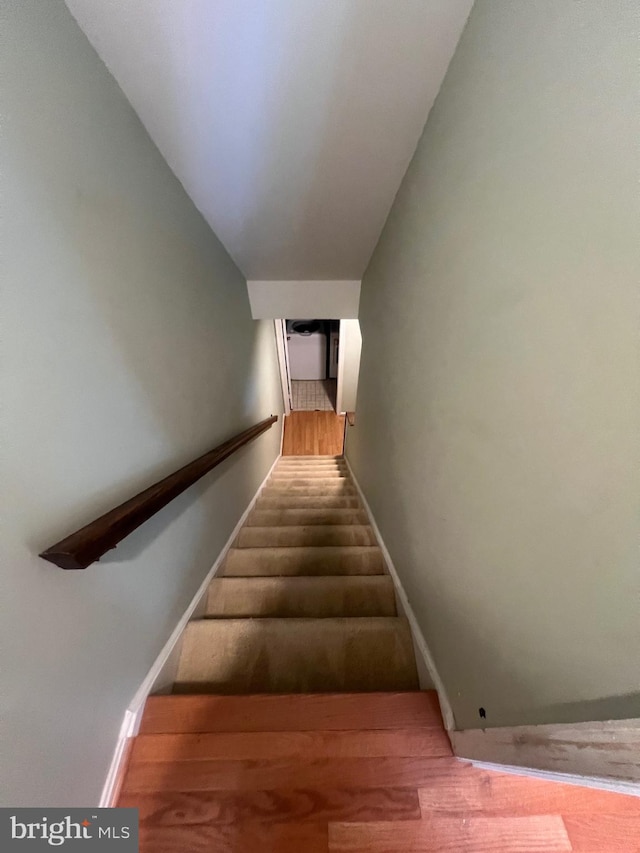 11708 Lone Tree Ct, Columbia, MD 21044 - staircase featuring baseboards