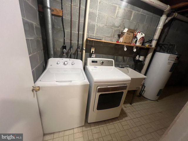 11708 Lone Tree Ct, Columbia, MD 21044 - washroom featuring washing machine and dryer, gas water heater, and concrete block wall
