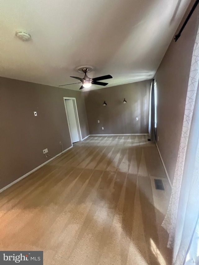 11708 Lone Tree Ct, Columbia, MD 21044 - empty room with light colored carpet, ceiling fan, and a smoke detector