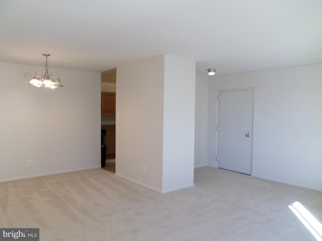 9900 Georgia Ave Unit 707, Silver Spring, MD 20902 - unfurnished room with carpet floors and a chandelier