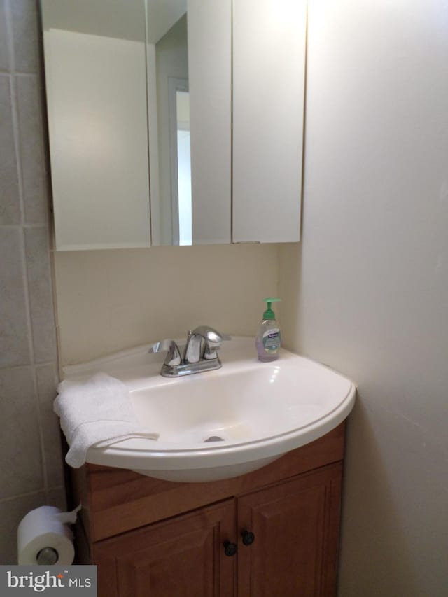 9900 Georgia Ave Unit 707, Silver Spring, MD 20902 - half bathroom with vanity
