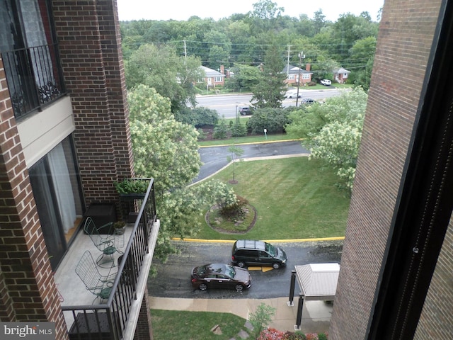 9900 Georgia Ave Unit 707, Silver Spring, MD 20902 - view of grassy yard with a balcony
