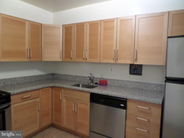 9900 Georgia Ave Unit 707, Silver Spring, MD 20902 - kitchen with stainless steel appliances and light tile patterned floors