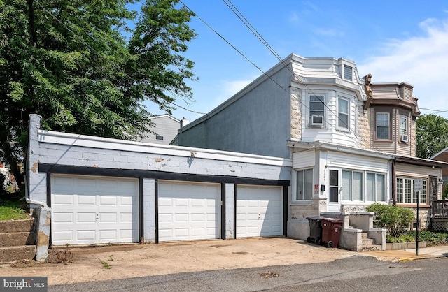 1105 Brown St, Wilmington, DE 19805 - view of front of home with a garage and cooling unit