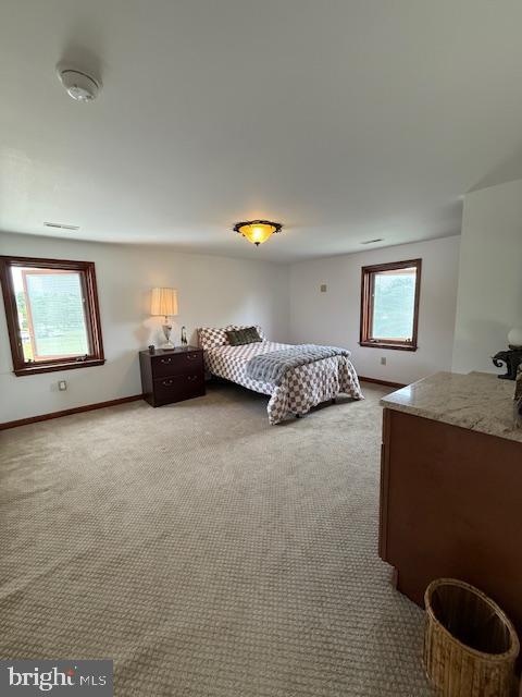 203 W Weymouth Rd, Vineland, NJ 08360 - bedroom with light colored carpet and baseboards