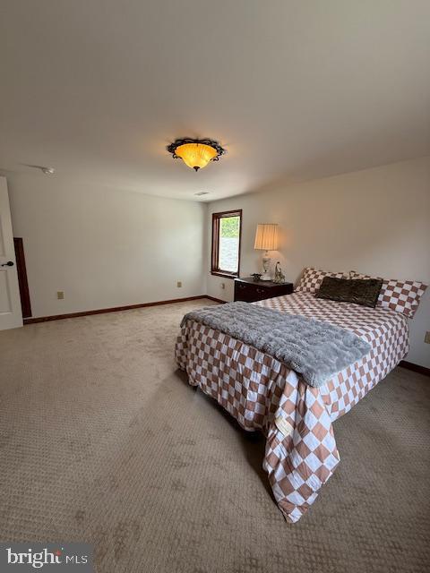 203 W Weymouth Rd, Vineland, NJ 08360 - carpeted bedroom featuring baseboards