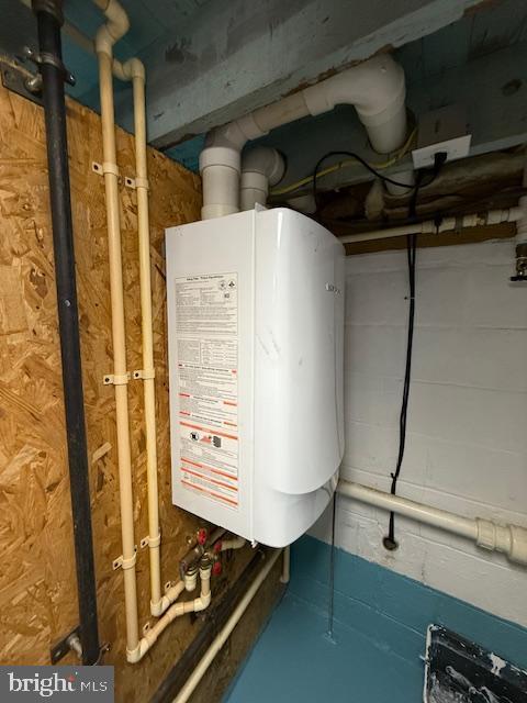 203 W Weymouth Rd, Vineland, NJ 08360 - utility room featuring water heater