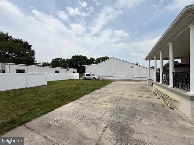 203 W Weymouth Rd, Vineland, NJ 08360 - view of yard featuring concrete driveway