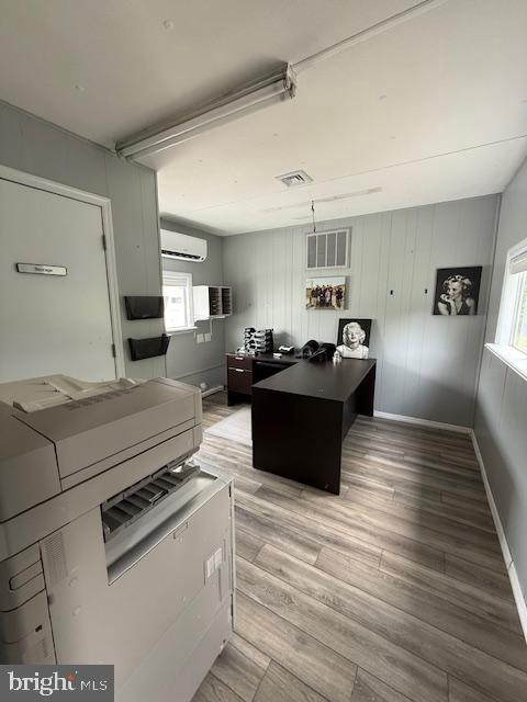 203 W Weymouth Rd, Vineland, NJ 08360 - office space with a wall mounted air conditioner and light wood-style flooring