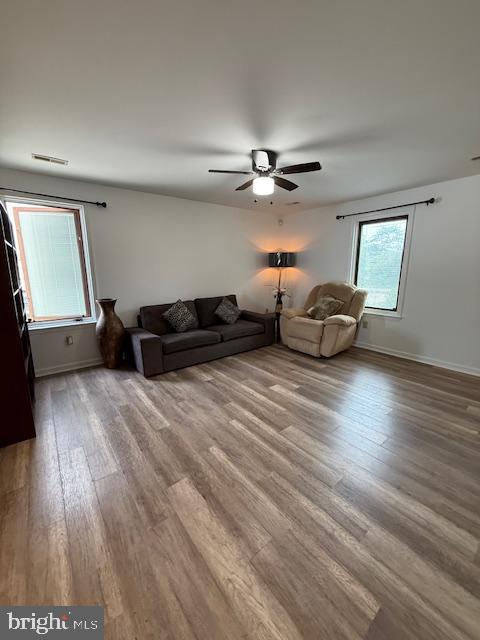 203 W Weymouth Rd, Vineland, NJ 08360 - living room with wood finished floors and ceiling fan