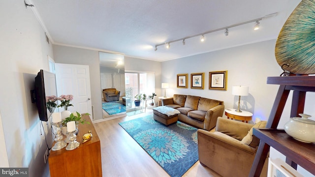 960 Fell St Unit 609, Baltimore, MD 21231 - living room with light wood-type flooring and ornamental molding