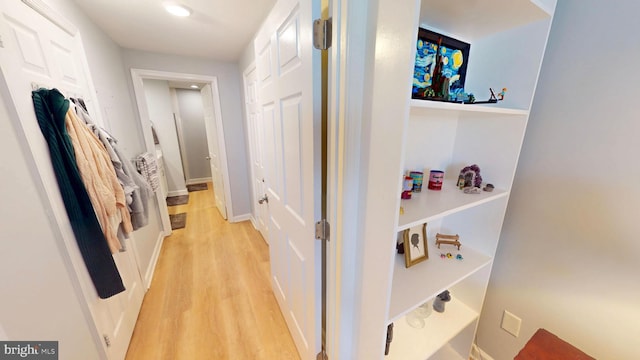 960 Fell St Unit 609, Baltimore, MD 21231 - corridor with light wood-style flooring and baseboards