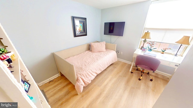 960 Fell St Unit 609, Baltimore, MD 21231 - bedroom featuring wood finished floors and baseboards