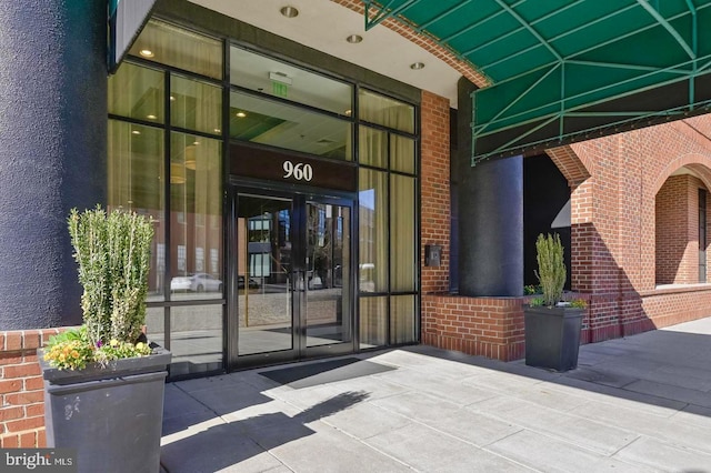 960 Fell St Unit 609, Baltimore, MD 21231 - view of exterior entry with brick siding and french doors