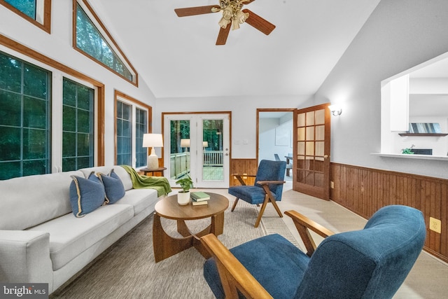 12779 Lost Creek Ct, Manassas, VA 20112 - living room featuring a wainscoted wall, ceiling fan, wooden walls, and high vaulted ceiling