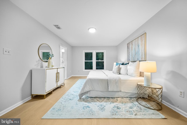 12779 Lost Creek Ct, Manassas, VA 20112 - bedroom with baseboards and wood finished floors