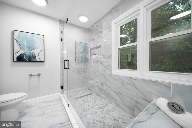 12779 Lost Creek Ct, Manassas, VA 20112 - bathroom featuring marble look tile flooring and a marble finish shower