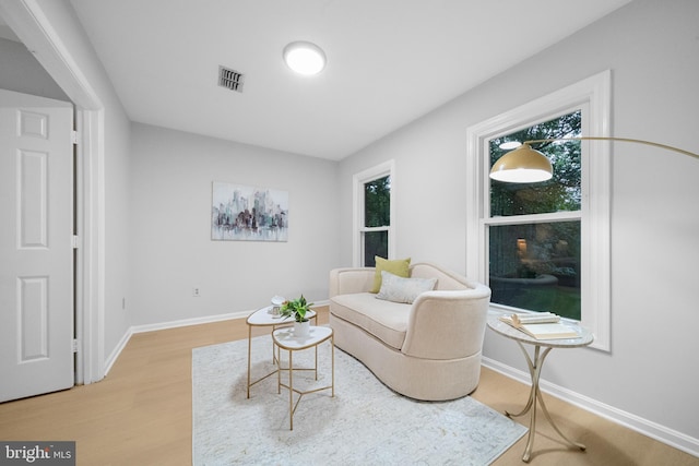 12779 Lost Creek Ct, Manassas, VA 20112 - living area featuring light wood-style flooring and baseboards
