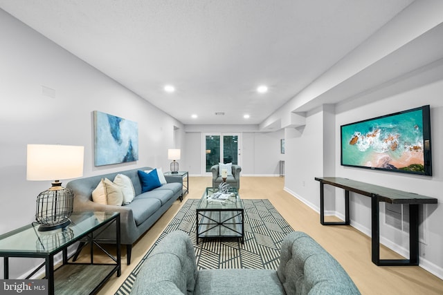 12779 Lost Creek Ct, Manassas, VA 20112 - living room featuring light wood-type flooring and recessed lighting