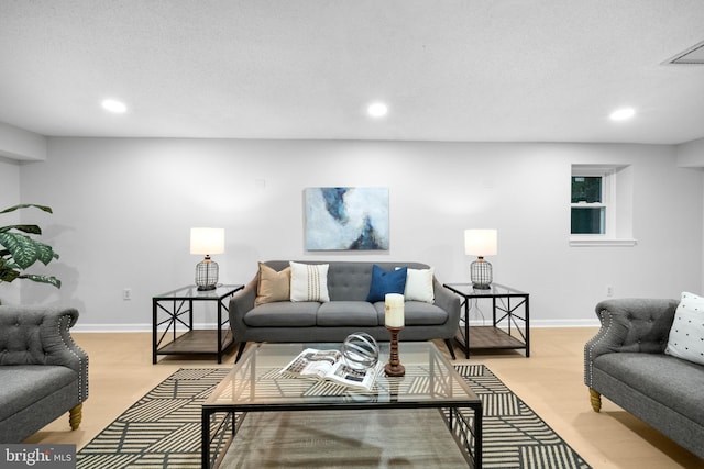 12779 Lost Creek Ct, Manassas, VA 20112 - living area with recessed lighting and light wood-style floors