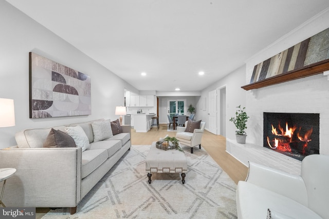 12779 Lost Creek Ct, Manassas, VA 20112 - living area featuring light wood-type flooring, recessed lighting, and a fireplace