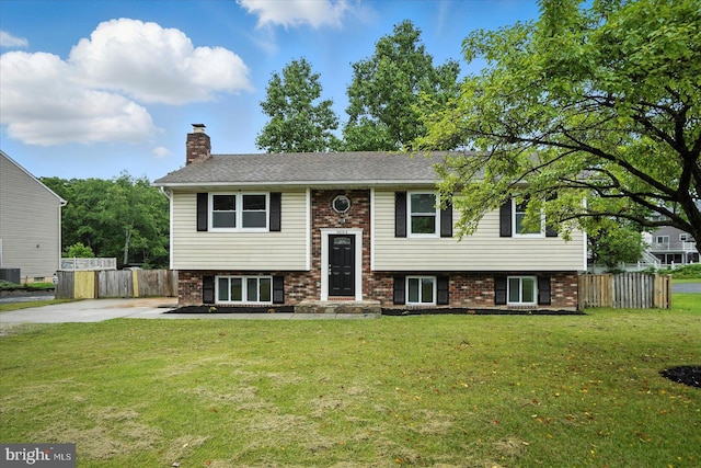9884 Bird River Rd, Baltimore, MD 21220 - raised ranch featuring brick siding and a chimney