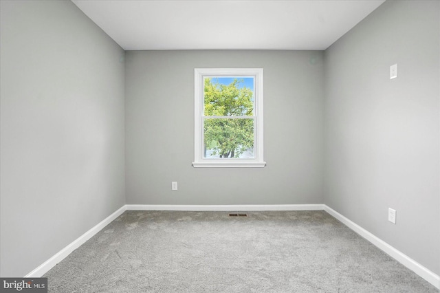 9884 Bird River Rd, Baltimore, MD 21220 - carpeted spare room with baseboards
