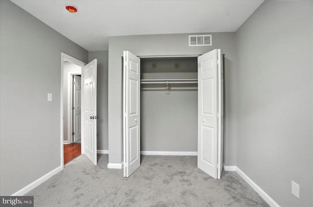 9884 Bird River Rd, Baltimore, MD 21220 - unfurnished bedroom featuring carpet floors and a closet