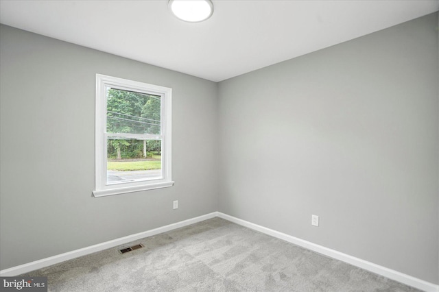 9884 Bird River Rd, Baltimore, MD 21220 - carpeted spare room with baseboards