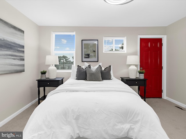 3708 Mohawk Ave, Baltimore, MD 21207 - bedroom featuring carpet and multiple windows