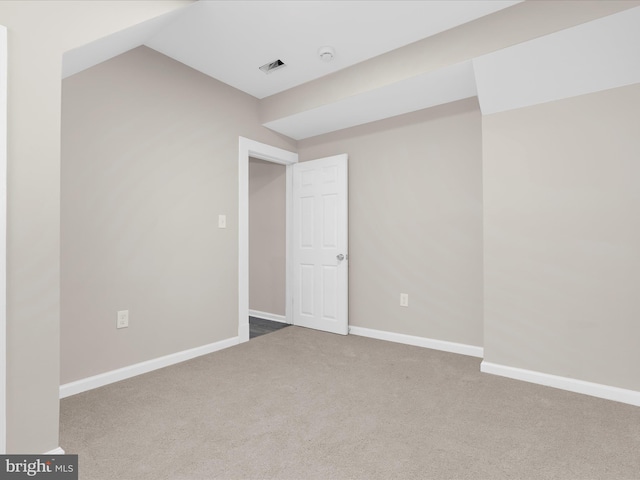 3708 Mohawk Ave, Baltimore, MD 21207 - unfurnished room featuring a smoke detector, carpet floors, and lofted ceiling