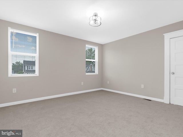 3708 Mohawk Ave, Baltimore, MD 21207 - carpeted spare room with baseboards