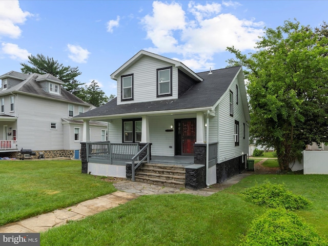 3708 Mohawk Ave, Baltimore, MD 21207 - bungalow-style home with a porch and a front lawn
