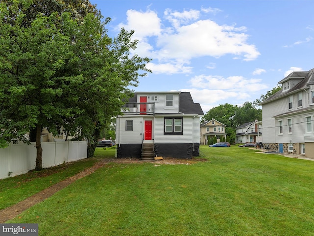 3708 Mohawk Ave, Baltimore, MD 21207 - rear view of house with a balcony and entry steps