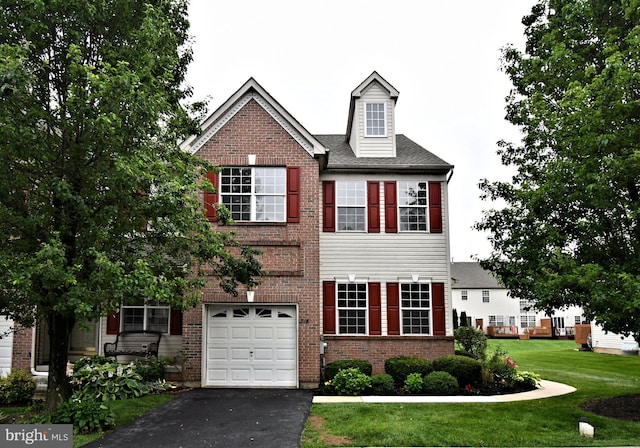 316 Wheatfield Cir, Hatfield, PA 19440 - view of front of property featuring a garage, asphalt driveway, a front lawn, and brick siding