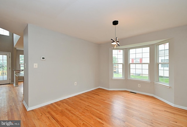 316 Wheatfield Cir, Hatfield, PA 19440 - empty room featuring light wood finished floors and a chandelier