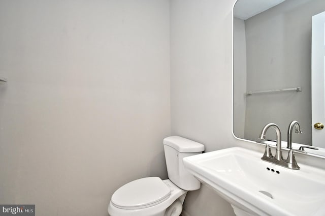 316 Wheatfield Cir, Hatfield, PA 19440 - half bathroom featuring a sink and toilet